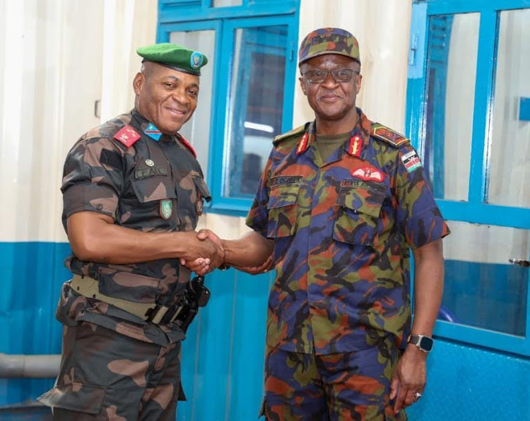 Gen Ogolla (R) with FARDC Chief of Land Forces, Lieutenant Gen Fall Sikabwe Asinda in Goma on December 2, 2023- Handout