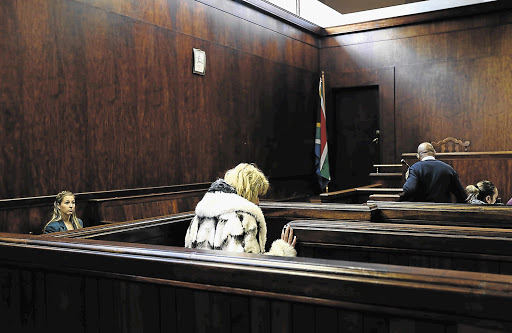 IN THE DOCK: The wife of the man dubbed the 'Springs Monster' was arrested and appeared in a Springs Magistrate's Court on the same charges as her husband. Her 36-year-old husband remains in custody on various charges including child abuse