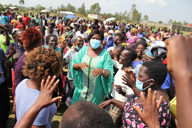 Homa Bay woman representative Gladys Wanga with women traders at Riat market in Kanyikela ward in Ndhiwa constituency on January 13,2021