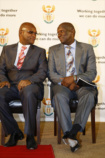 FILE PICTURE: Nathi Mthethwa congratulating the new SAPS commissioner Bheki Cele after the announcement by the President in Pretoria. Pic. Kopano Tlape . © Sowetan.