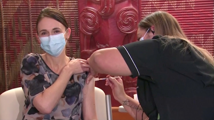 New Zealand's Prime Minister Jacinda Ardern receives her first dose of the Pfizer coronavirus disease (Covid-19) vaccine at a vaccination centre in Auckland, New Zealand, June 18, 2021, in this still image taken from video.
