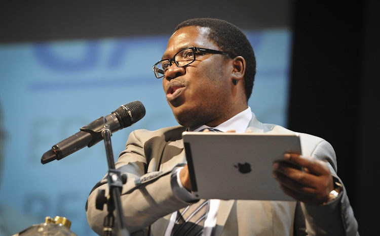 Gauteng education MEC Panyaza Lesufi did a walk-about before addressing a tent full of parents.