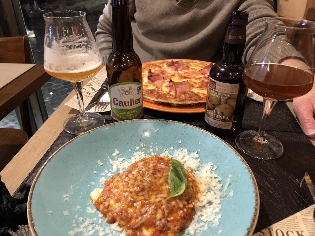 Gf beers were great (especially chestnut one), gf lasagne good! Pizza, the crust was weird texture, lots of air holes underneath.