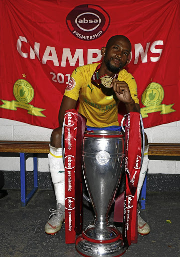 Mosa Lebusa poses with the Absa Premiership trophy after Saturday's match against Stars at Goble Park. / gallo images/ Steve Haag