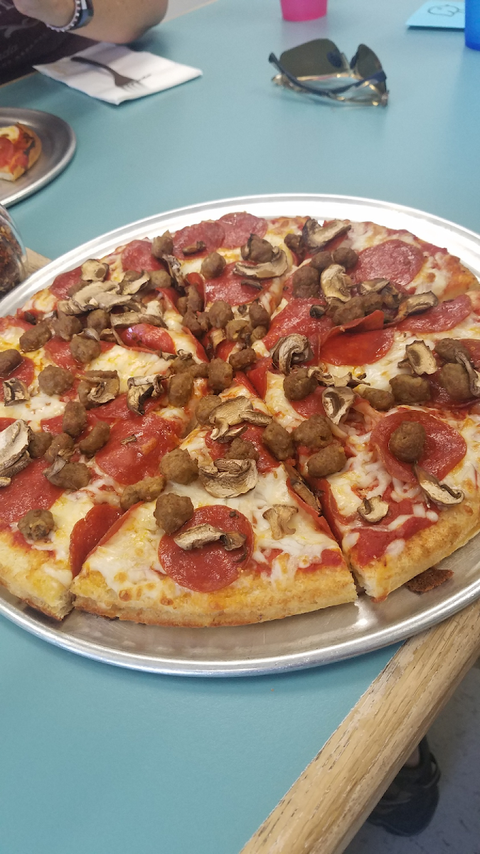 Gluten free 12" thick crust, pepperoni, sausage, and mushrooms. Super yummy!