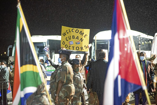 A Cuban team of 216 health professionals arrive at the Waterkloof Airforce Base in Pretoria to help fight the spread of Covid-19 in South Africa. / ER Lombard