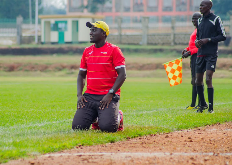 Kakamega HomeBoyz Tactician Nichollus Muyoti reacts on the torch line in BuKhungu Stadium during the past match.