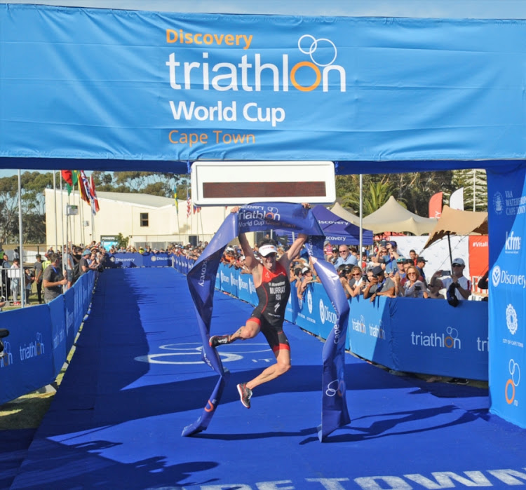 Richard Murray wins the Men's Elite event during the 2018 Discovery Triathlon World Cup Cape Town at Quay 6, V&A Waterfront on February 11, 2018 in Cape Town, South Africa.