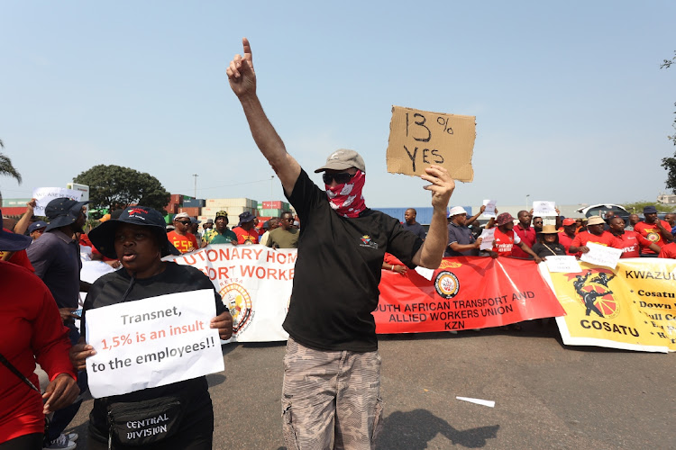 Transnet employees picketed outside the state-owned entity's office on the Bluff, south of Durban last week. The company has finally signed a wage deal with one of the worker's unions.