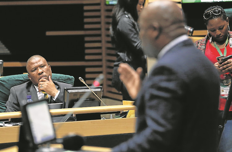 Eastern Cape premier Oscar Mabuyane listens to provincial DA leader Nqaba Bhanga challenging the government over officials who have taken more than a million days of sick leave in two years.