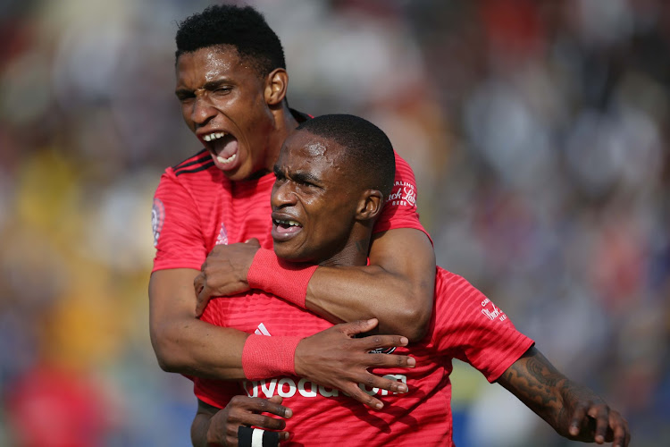 Orlando Pirates' winger Thembinkosi Lorch (R) and Vincent Pule (L) celebrates during the Absa Premiership 2-2 draw against Cape Town City in Cape Town on May 4 2019.