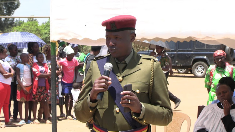 A GSU official during the send off of the Boniface Muthii in Mwea ,Kirinyaga county.