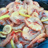 Thumbnail For Basting Shrimp In Butter Sauce.