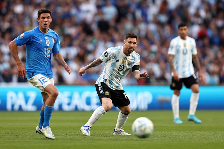 Lionel Messi of Argentina in action with Matteo Pessina of Italy during the Finalissima 2022 match at Wembley Stadium in London on June 1 2022.