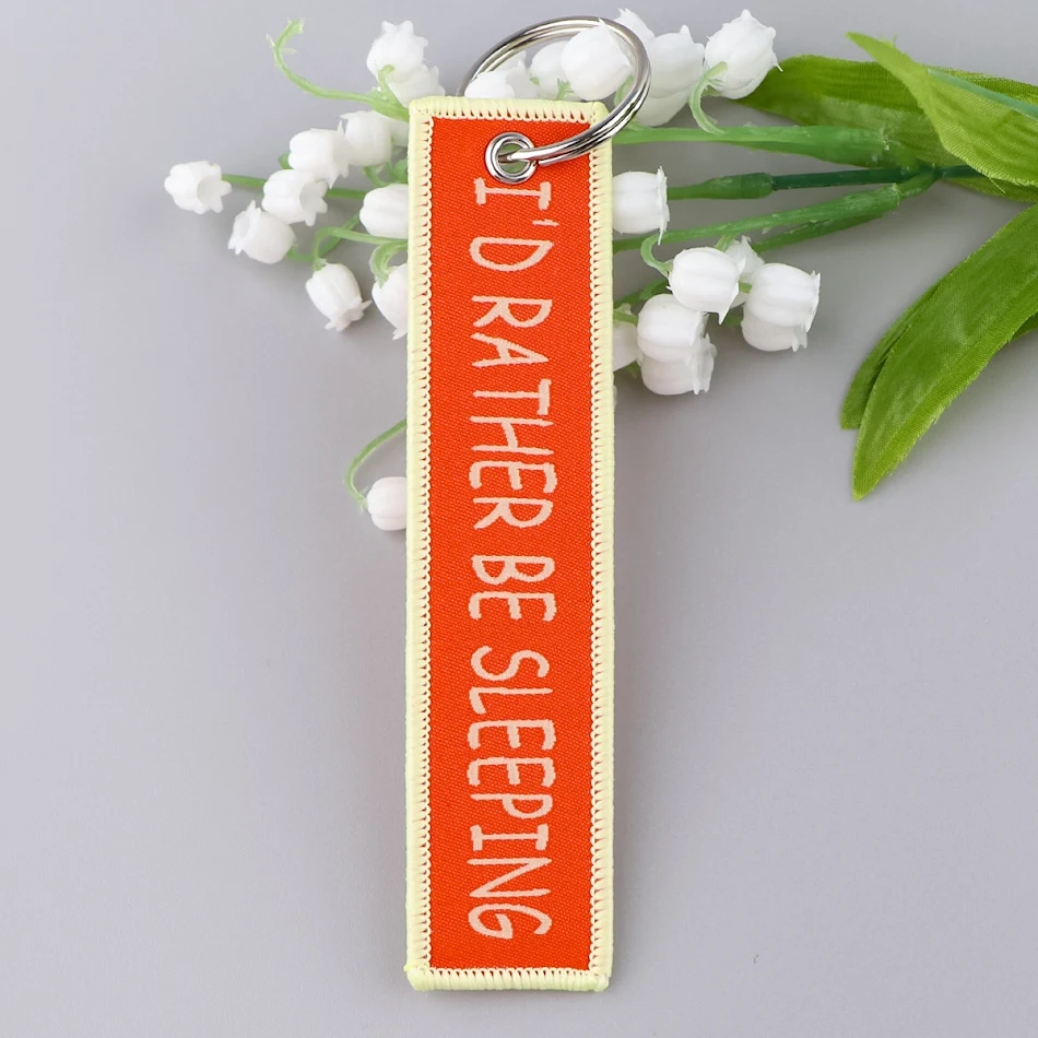 Porte-clés accessoires en tissu avec citation simple