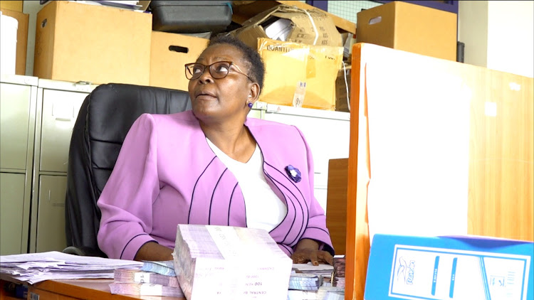 Chief Officer Noel Malanda after being nabbed by EACC in her office.