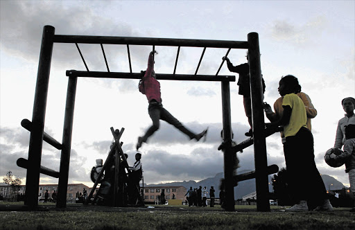 HANGING ON: Local children at play