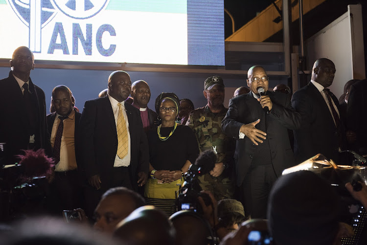 Zuma addresses a crowd of ANC supporters outside Parliament on Tuesday evening, after surviving yet another vote of no confidence....