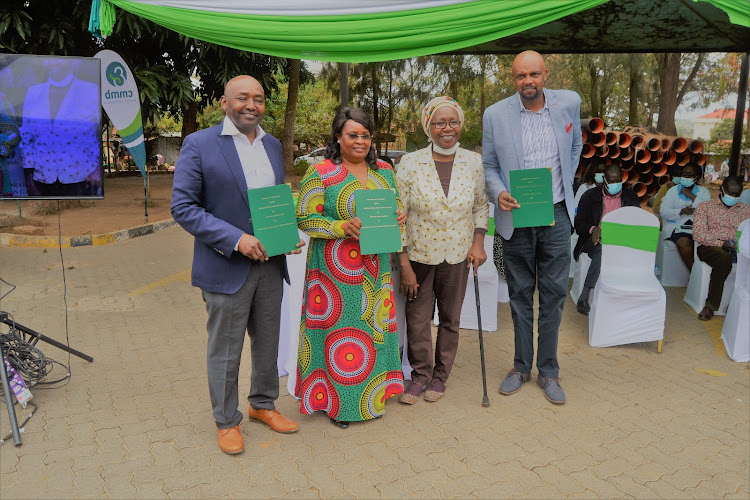 CMMB country director James Kisia, Kitui county CEC for Health Dr Winnie Kitetu, the Bristol Myers Squibb Foundation country lead Dr Lilian Kimani and the the National Cancer Institute head of regulation Dr Martini Mwangi in Kitui ceremony on Wednesday