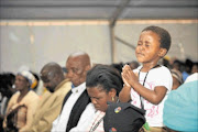 LEARNING YOUNG : A young girl attends the prayer service for the gang-rape video victim in Doornkop recreation centre in Soweto. Photo: Tsheko Kabasia