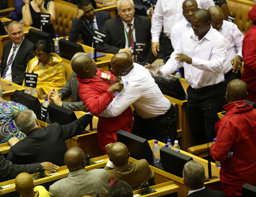Economic Freedom Fighters were removed from parliament during Presidents Jacob Zuma's State of the Nation Address at parliament, Cape Town.