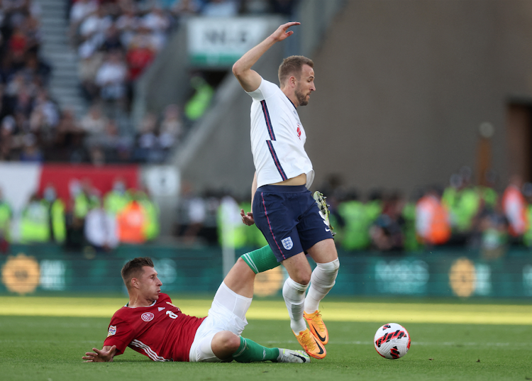 Hungary's Willi Orban tackles England's Harry Kane during a Uefa Nations League match at Molineux Stadium, Wolverhampton