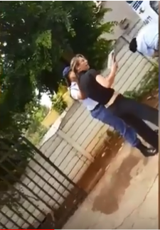 This video of cops holding a woman by the hair while arresting her has caused raging debate about the amount of force appropriate while handling a suspect.