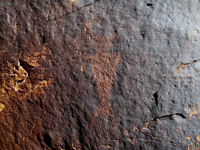 Abraded and pecked petroglyph