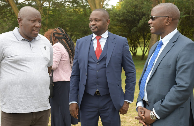 The CEO, CIC Insurance Group Limited Patrick Nyaga (R) has a word with members from different saccos during the company’s Annual Cooperative Summit in Great Rift Valley Lodge in Naivasha.
