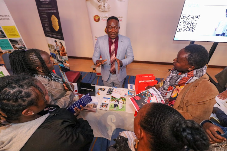 Johnmartins Ezeoha a medical Tourism officer from Thumbay Hospital, Dubai interacts with Travel agents from Kenya at Movenpick Nairobi on September 22, 2022.