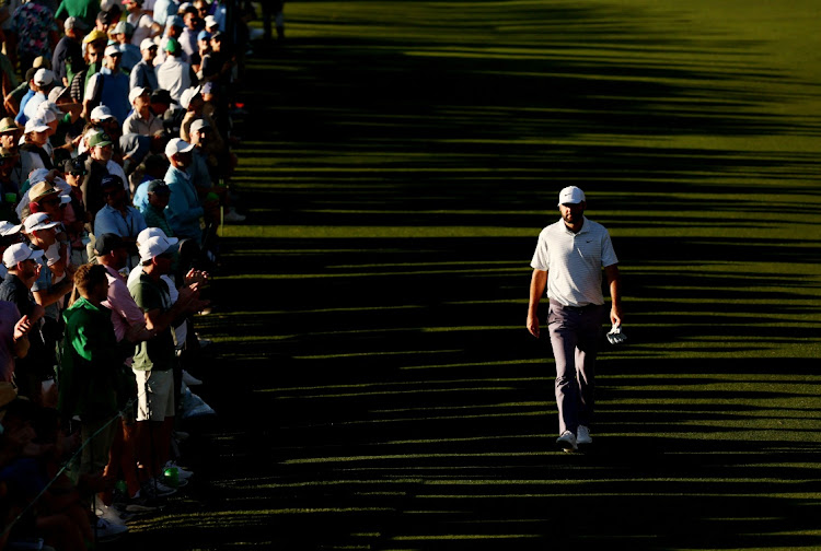 Scottie Scheffler of the US on the 18th hole during the third round of The Masters at Augusta National Golf Club in Augusta, Georgia on Saturday.