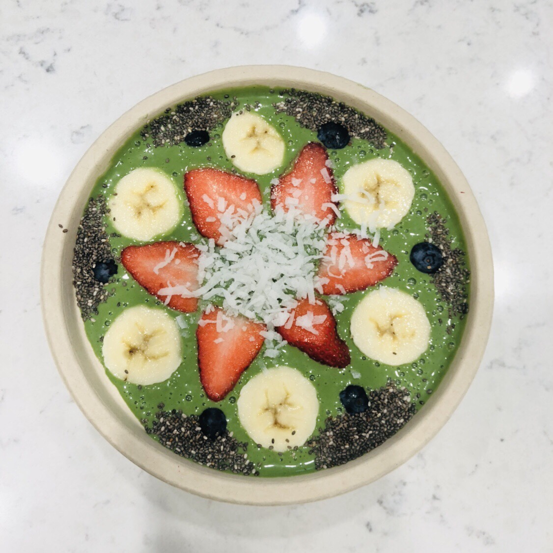 Green bowl with extra toppings