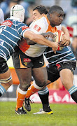 Cheetahs' Trevor Nyakane bursts  through Griquas' ranks  Photo: Gallo Images