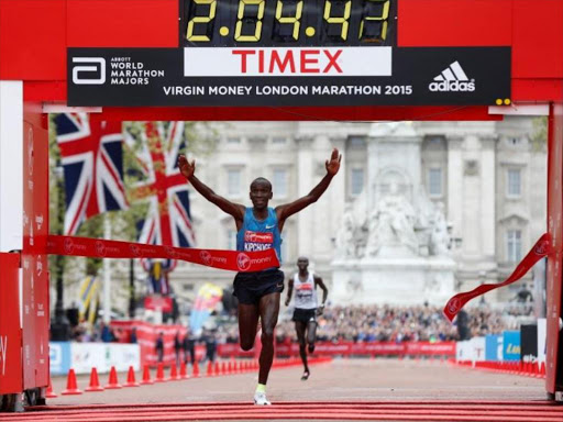 Kenya's Eliud Kipchoge celebrates after winning the Men's Elite race. Photo/REUTERS