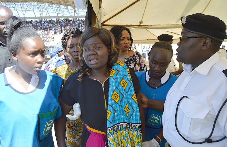 One of the mothers of the 14 pupils who perished in Kakamega Primary School tragedy during a memorial service at Bukhungu Stadium, Kakamega county, on February 7, 2020