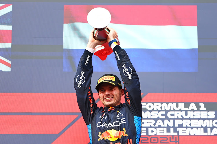 Race winner Max Verstappen of the Netherlands celebrates on the podium in Imola, Italy, May 19 2024. Picture: Mark Thompson/Getty Images