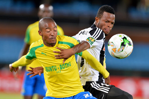 Thapelo Morena of Sundowns and Mechak Elia of TP Mazembe during the CAF Super Cup match between Mamelodi Sundowns and TP Mazembe at Loftus Versfeld on February 18, 2017 in Pretoria. South Africa. Photo by Lefty Shivambu/Gallo Images