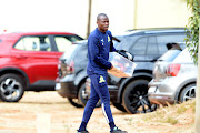 Mamelodi Sundowns player Hlompho Kekana in the parking lot at the club's Chloorkop headquarters ahead of a training session on August 26 2021.