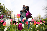 Katie Shanahan kisses her son Liam, 1, during the Spring BloomFest at the Stevens-Coolidge House and Gardens on Mother's Day in North Andover, Massachusetts, U.S.