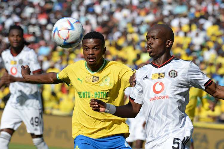 Teboho Mokoena of Mamelodi Sundowns and Nkosinathi Sibisi of Orlando Pirates during the MTN8 semifinal, first leg match at Orlando Stadiumin Johannesburg on October 1 2022.