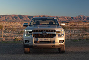 Ford's beefy new Ranger towering over the wilderness.