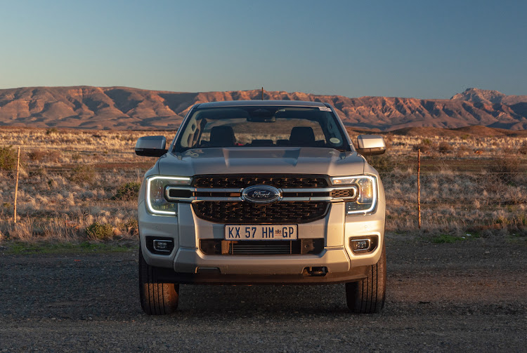 Ford's beefy new Ranger towering over the wilderness.