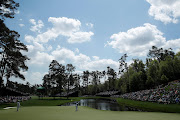 Justin Thomas of the U.S. putts on the 17th green during the second day of practice for the 2018 Masters golf tournament at Augusta National Golf Club in Augusta, Georgia, U.S. April 3, 2018. 