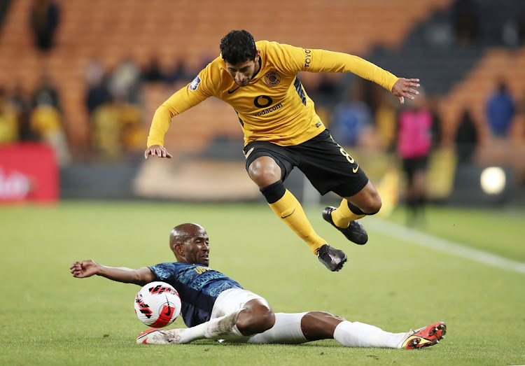 Leonardo Castro of Kaizer Chiefs is tackled by Mosa Lebusa of Mamelodi Sundowns in the DStv Premiership match between at FNB Stadium in Johannesburg on May 8 2022.