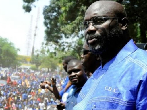 George Weah won the first round of the election - but not by enough to avoid a run-off vote. AGENCIES