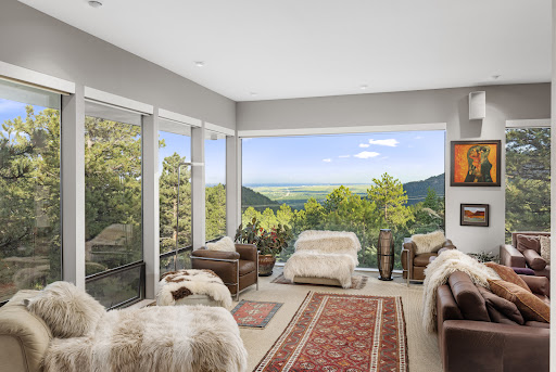 Living room with panoramic valley view in this luxury house for sale in Boulder ($2,995,000)