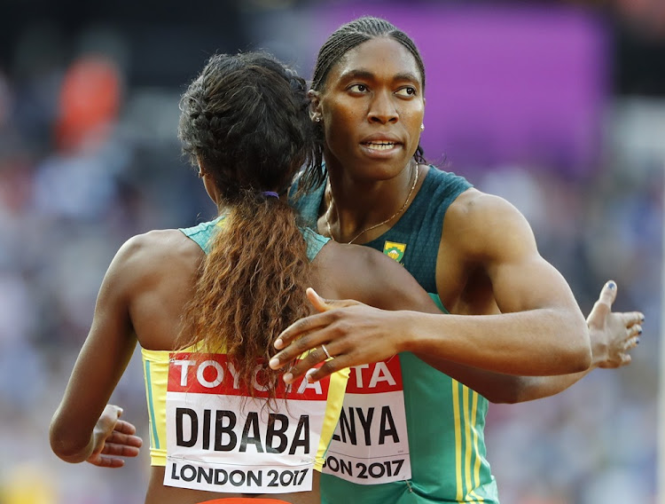 Genzebe Dibaba of Ethiopia and Caster Semenya of South Africa react after the 1500m race in London on 7 August 2017.