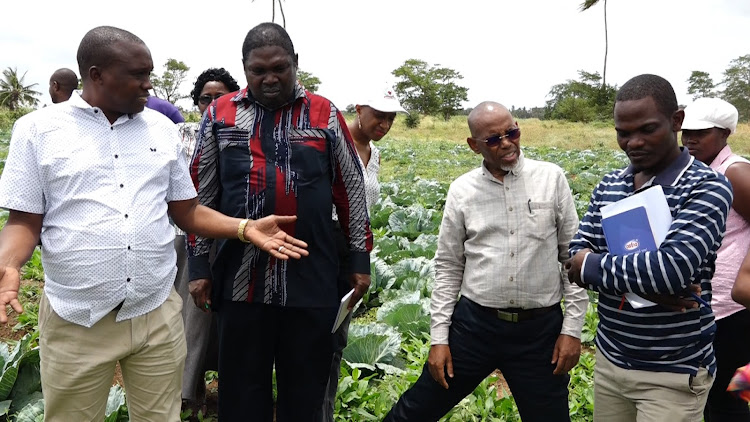 Dr Joseph Rutumoi, Ephantus Murage and ADC MD Ali Bule in Malindi