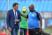 Mamelodi Sundowns coach Pitso Mosimane and Platinum Stars' head coach Roger De Sa during the Absa Premiership match between Mamelodi Sundowns and Platinum Stars at Loftus Versfeld Stadium on January 20, 2018 in Pretoria.