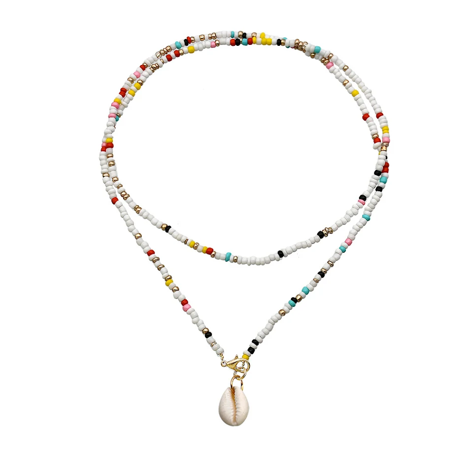 Handgemaakte lange ketting met rijstvormige kralen in kleur, dubbele laag schelp kruis hanger, een elegante en opvallende accessoire.